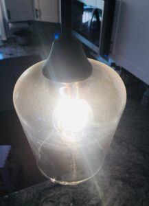 Light fixture before cleaning – dull from dust and dirt