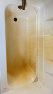 Dirty shower with rust and stains before professional cleaning in Whitman MA - Sirley Cleaning Services