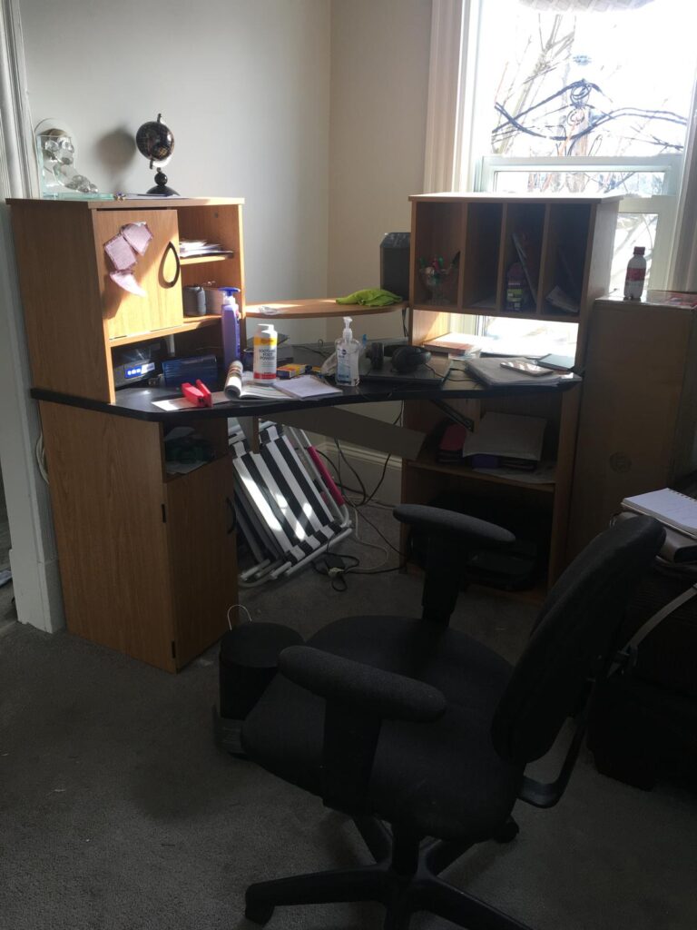 Home office desk area before cleaning in Bridgewater, MA