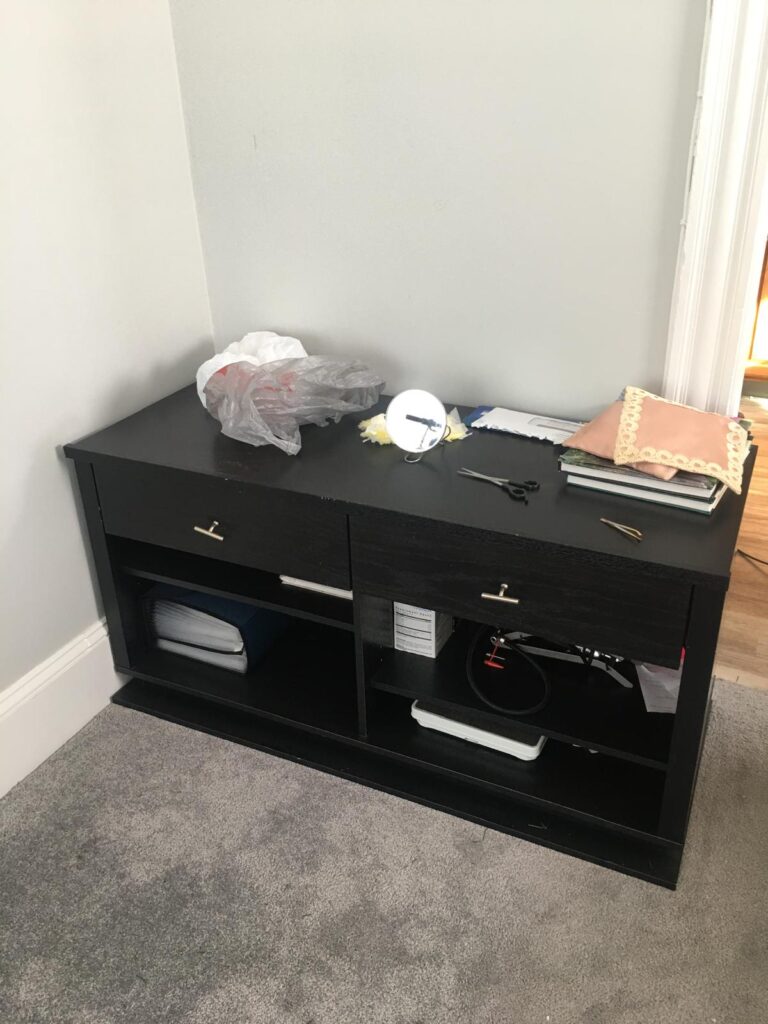 Cluttered dresser top before house cleaning in Bridgewater, MA